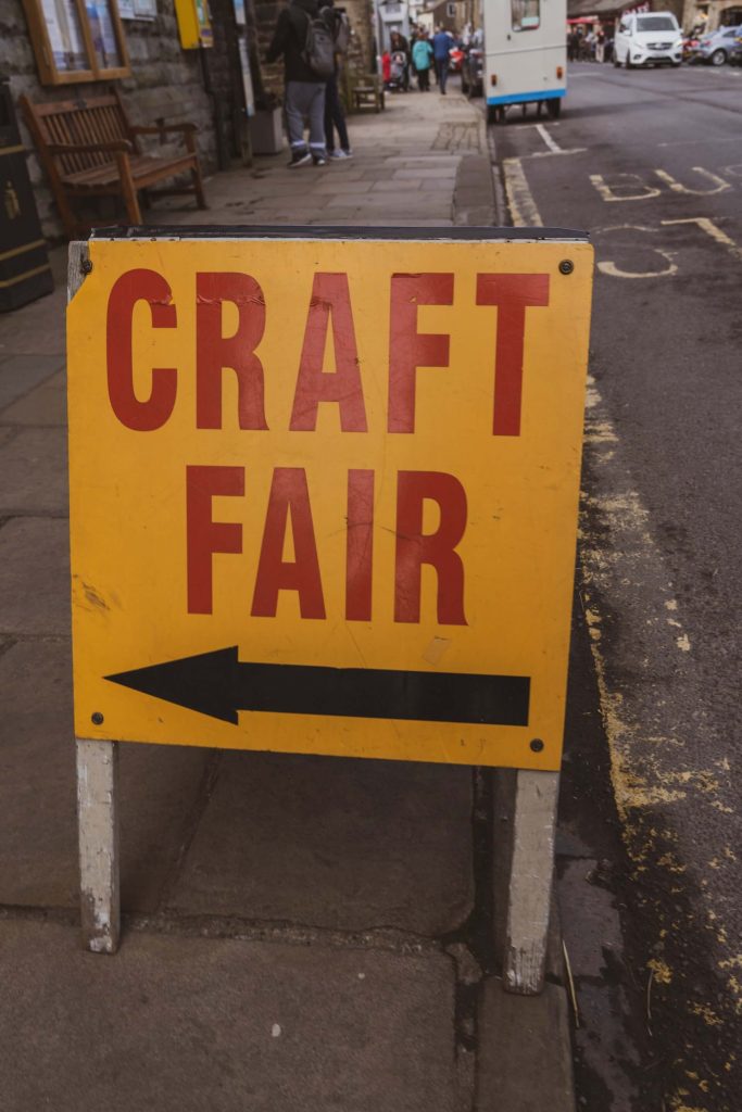 Sign pointing to a "Craft Fair"